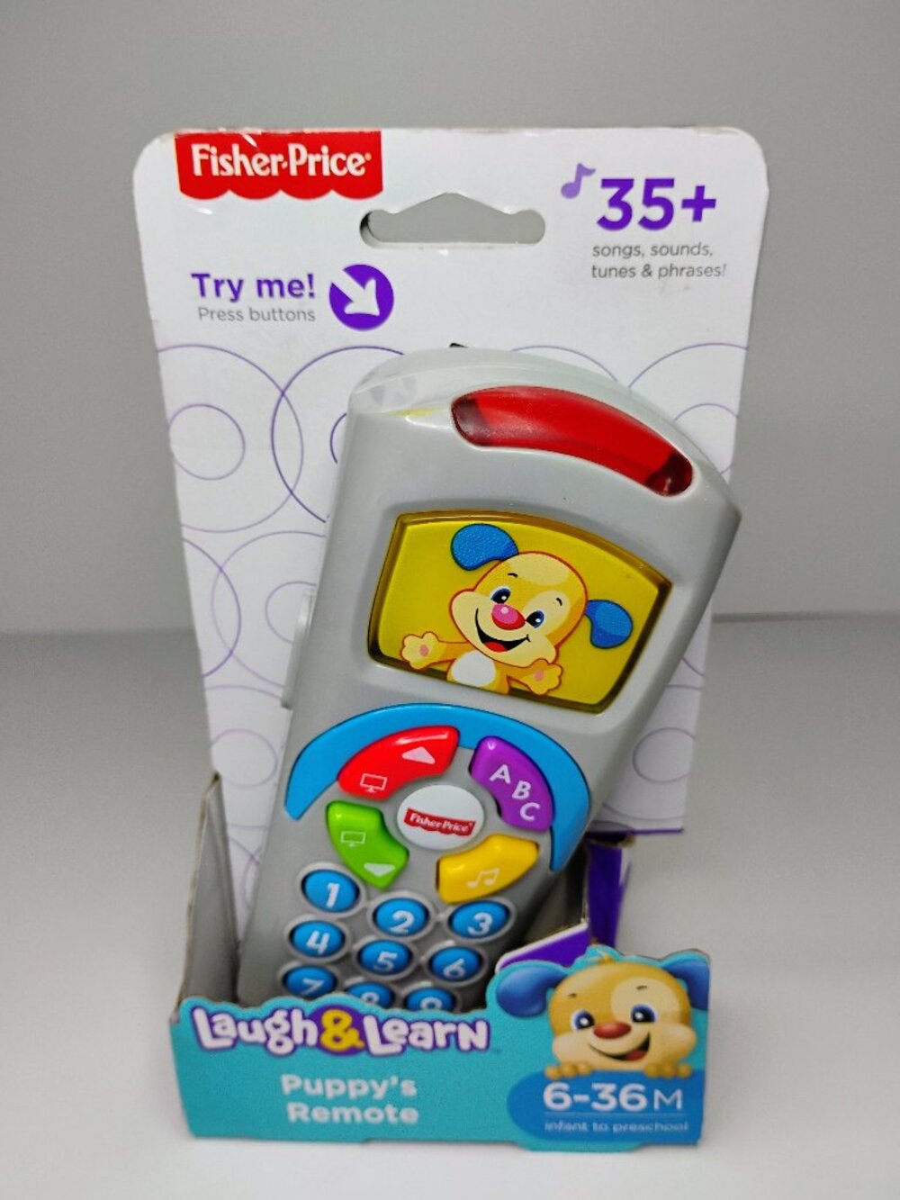Fisher-Price Laugh & Learn Puppy's Remote 35+ Songs, Sounds, Tunes, & Phrases